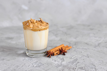 Homemade Dalgona coffee in glass, popular Korean drink latte