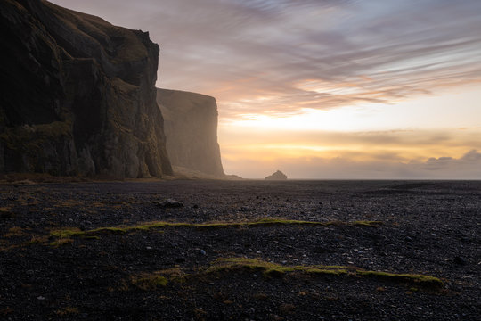 Scenic cliffs at Vik i Myrdal during sunrise on a foggy day - no. 3