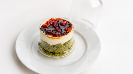 Creamy pie with basil, cheese and tomato jam in a glass. Bizcocho Mediterráneo