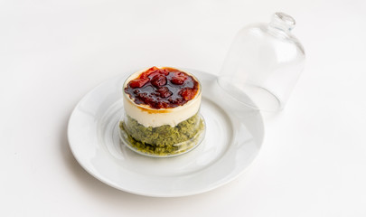 Creamy pie with basil, cheese and tomato jam in a glass. Bizcocho Mediterráneo