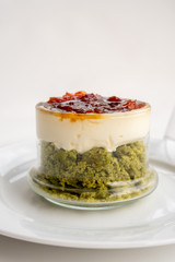 Creamy pie with basil, cheese and tomato jam in a glass. Bizcocho Mediterráneo