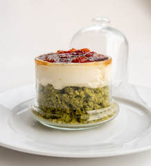 Creamy pie with basil, cheese and tomato jam in a glass. Bizcocho Mediterráneo