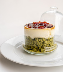 Creamy pie with basil, cheese and tomato jam in a glass. Bizcocho Mediterráneo