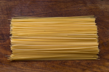 spaghetti on a wood background