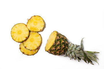 Fresh pineapple on a white background. Sliced exotic fruit waiting to be eaten.