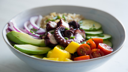 Poke bowl with octopus and avocado