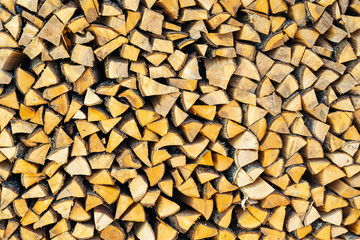 Texture of woodpile beautiful background of chopped wood