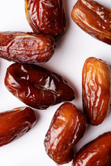 Royal, big dates on a white background, close-up, flat lay.