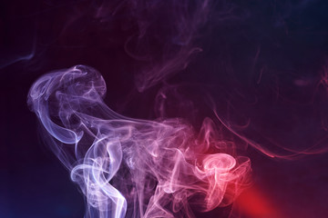 Fototapeta premium Smoke with different colors Photographed in the studio with colorful flash light