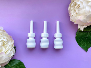 Female laxative medical liquid glycerin suppositories for intimate hygiene. Health concept.