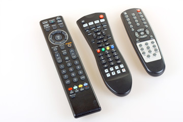 Three different versions of remote controls on White background.