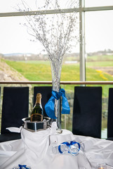 Wedding Champagne Glasses with a bottle of champagne