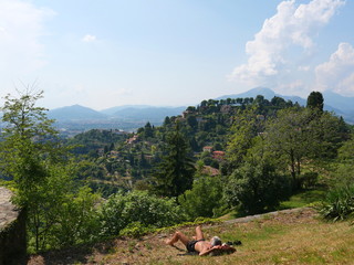 A man sunbathing with beautiful view