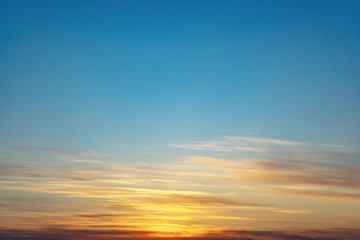 Beautiful clear, morning sky at sunrise, natural background. Soft pink clouds.