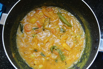 Special tasty onion curry in a non stick pan.