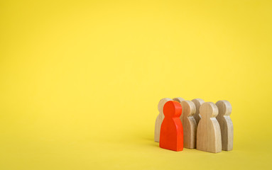 Group of wood figure Stand in rows and leaders standing forward in human resource management concepts Teamwork.Success Leadership, Business Progress and Competition on yellow backgrond and copy space.