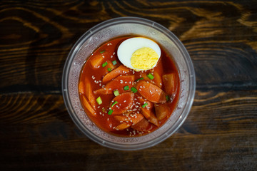 Take out Korean food Stir-fried Rice Cake Tteok-bokki in microwaveable container.