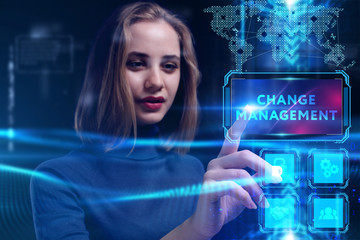 Business, Technology, Internet and network concept. Young businessman working on a virtual screen of the future and sees the inscription: Change management