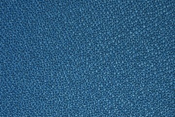 The texture and pattern of the fabric is used for the background.