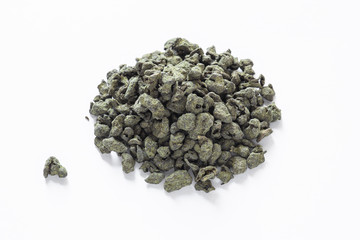 milk oolong, traditional chinese tea, dry tea leaf for a fragrant hot drink, isolate on white background,