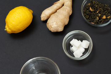 Health remedy foods for cold and flu relief on a black background.