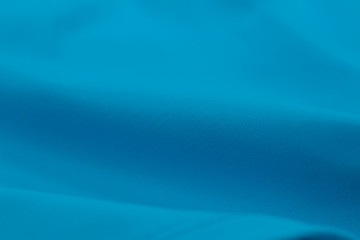 Blue fabric clothing texture textile pattern blur background.