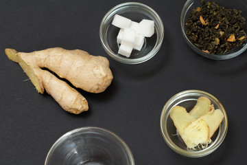 Health remedy foods for cold and flu relief on a black background.