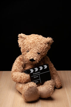 image of toy bear clapper board 