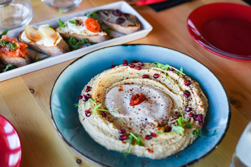 tasty lebanese humus close up view