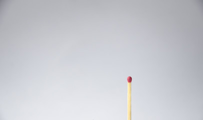 A single match on a white background.