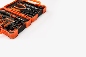 . A set of professional tools in a case for repairing phones, smartphones, computers and other office equipment.