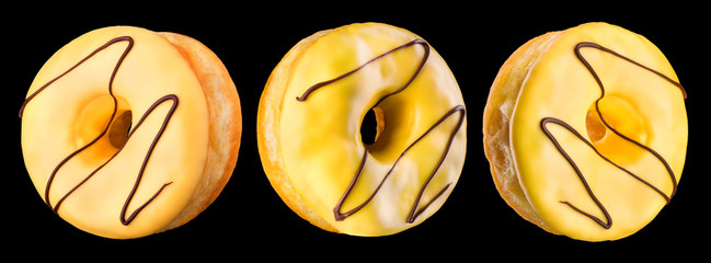 Set of glazed donuts with sprinkles on a black background