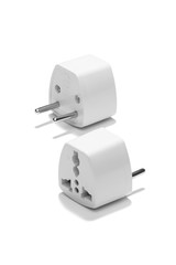 Subject shot of two universal adapters for a power socket. Each plug is made according to the...