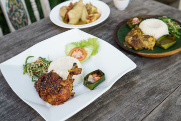 ayam balado. indonesian food cuisine chicken with chilli paste served with rice