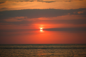 landscape. sunset over the sea. red sun.