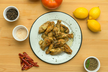 Portion of delicious chicken wings