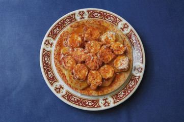 Galician wing octopus served on a plate