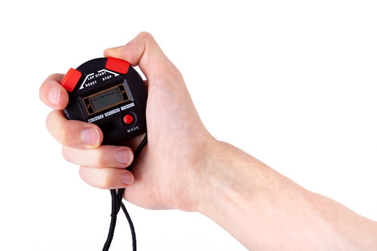 Professional black red sports digital stopwatch in hand, finger pressing the start button, man holding up a simple electronic timer, time measurement, competition, race abstract concept, isolated