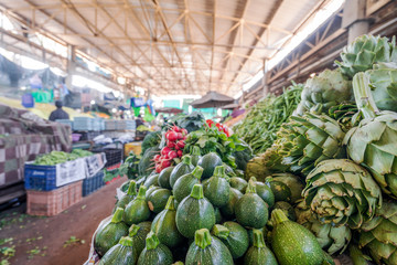 Fresh zucchini and other green veggies being sold on market in Agadir, Morocco, Africa