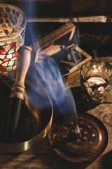 Smoke of an incense cone and bowl