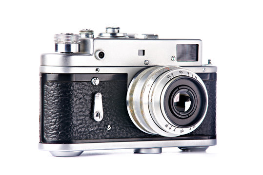 Old retro rangefinder camera isolated white