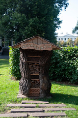 Naklejka premium House for firewood in the Park