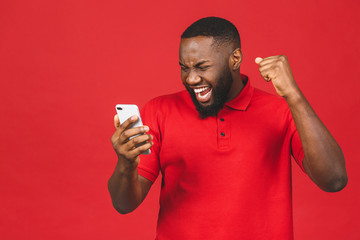 Photo of overjoyed black african american man knowing that he became winner of something so...