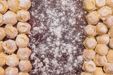 Dumplings in flour, cooked at home, culinary composition, copy space
