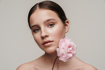 Image of seductive nice shirtless woman posing with pink peony