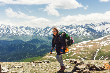 Fototapeta premium Hipster girl backpacker the mountain.