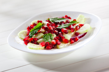 Cucumber onion and pomegranate fresh salad for healthy nutrition