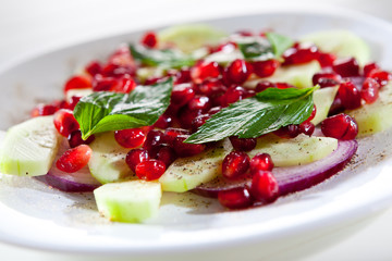 Cucumber onion and pomegranate fresh salad for healthy nutrition