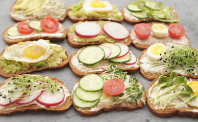 Sandwiches with healthy vegetables and micro greens.