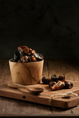 Dates are served on a wooden table
